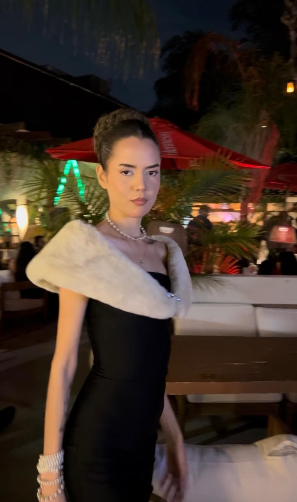 A guest at an evening gathering